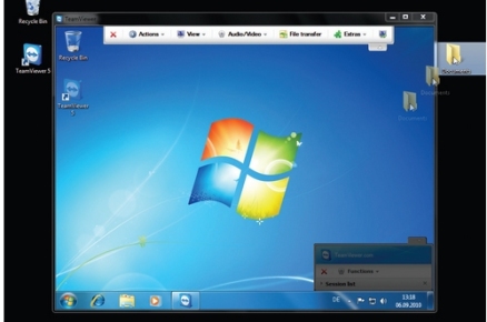 Cuando la conexión se haya realizado, veremos el escritorio del equipo remoto y podremos utilizarlo. TeamViewer incorpora algunas opciones interesantes, como la posibilidad de arrastrar archivos entre los equipos conectados